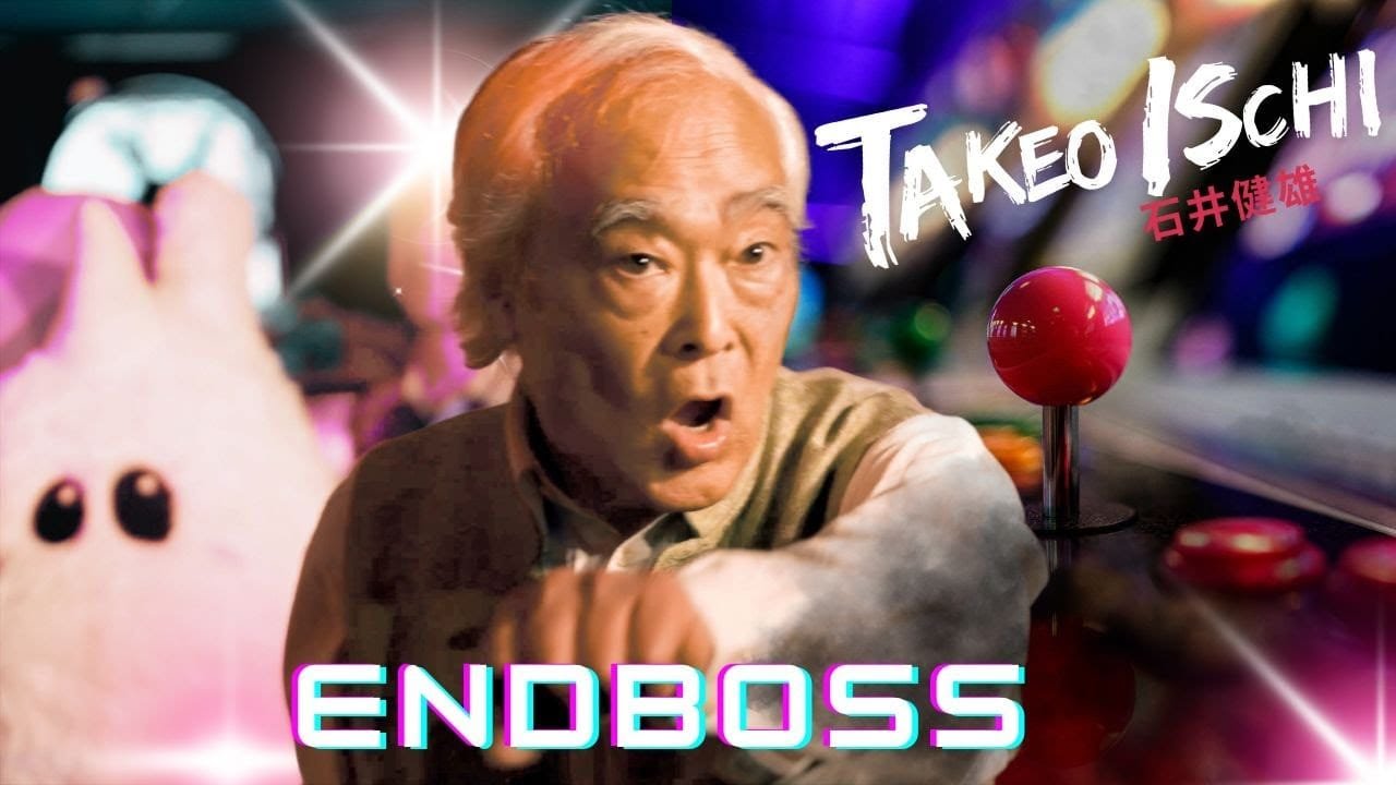 Takeo Ischi holding a chicken takeo endboss